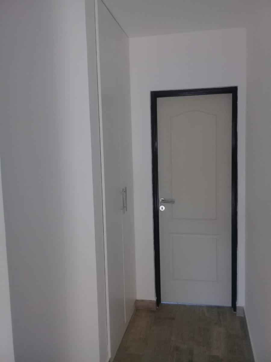 Excelente Duplex de 3 ambientes a ESTRENAR, PB: entrada de auto, living, toilette, cocina comedor diario, jardín y parrilla. PA: 2 dormitorios con placard y balcón, baño completo. — foto 8