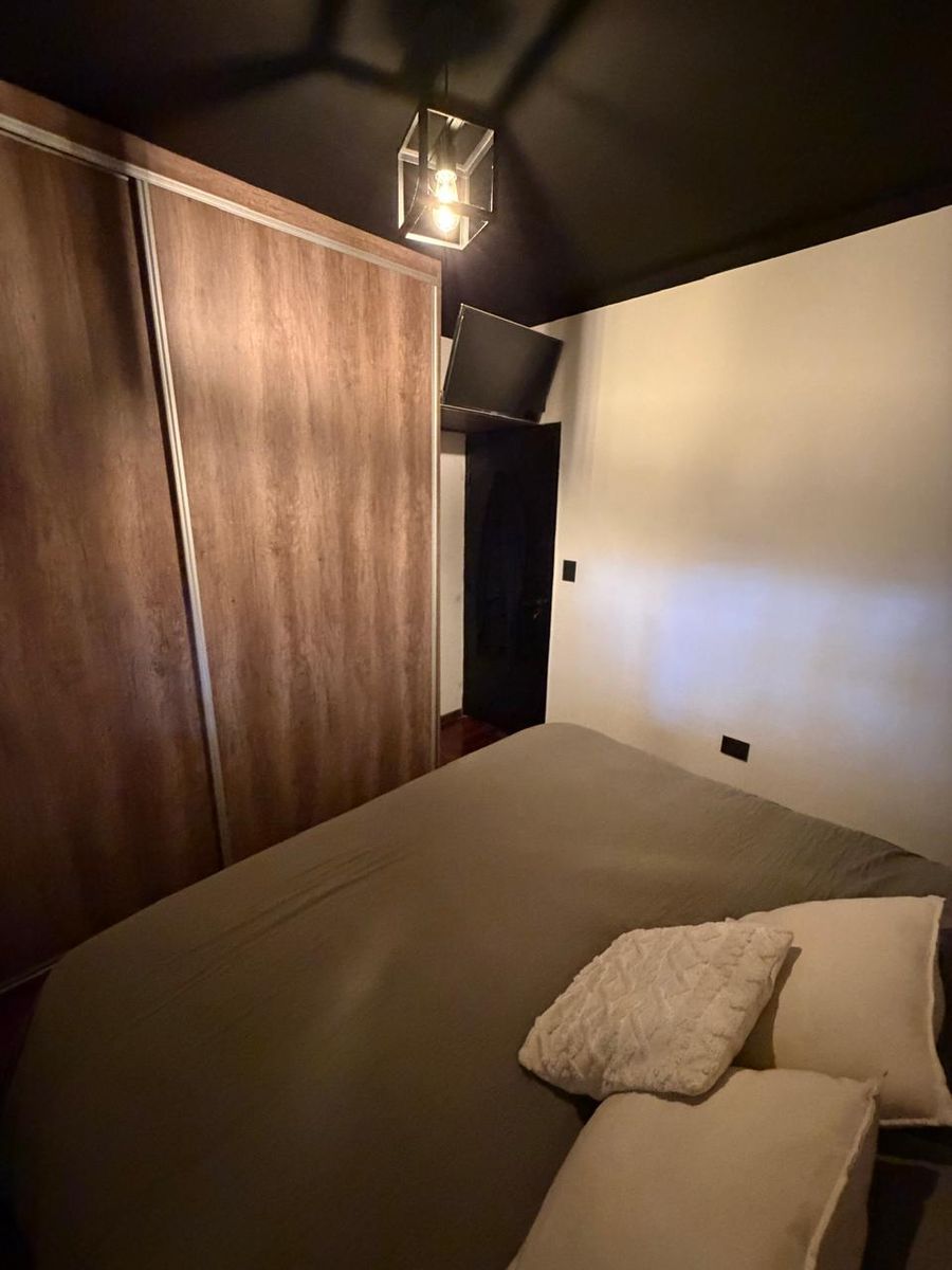 Venta de chalet reciclado a nuevo de 3 ambientes con quincho cerrado, patio y cochera - Boulevard San Martín al 2500 - 7