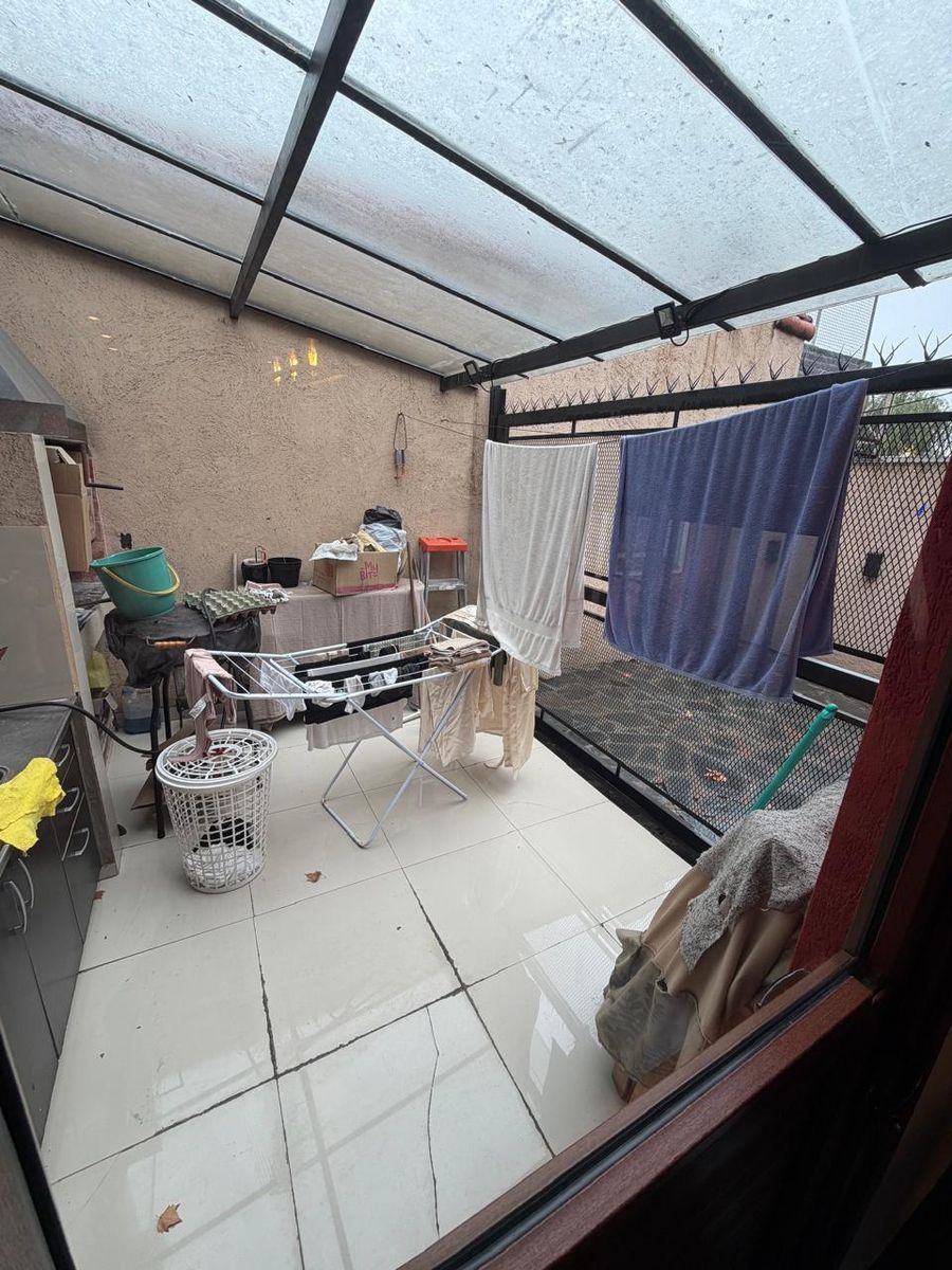 Venta de chalet reciclado a nuevo de 3 ambientes con quincho cerrado, patio y cochera - Boulevard San Martín al 2500 - 10
