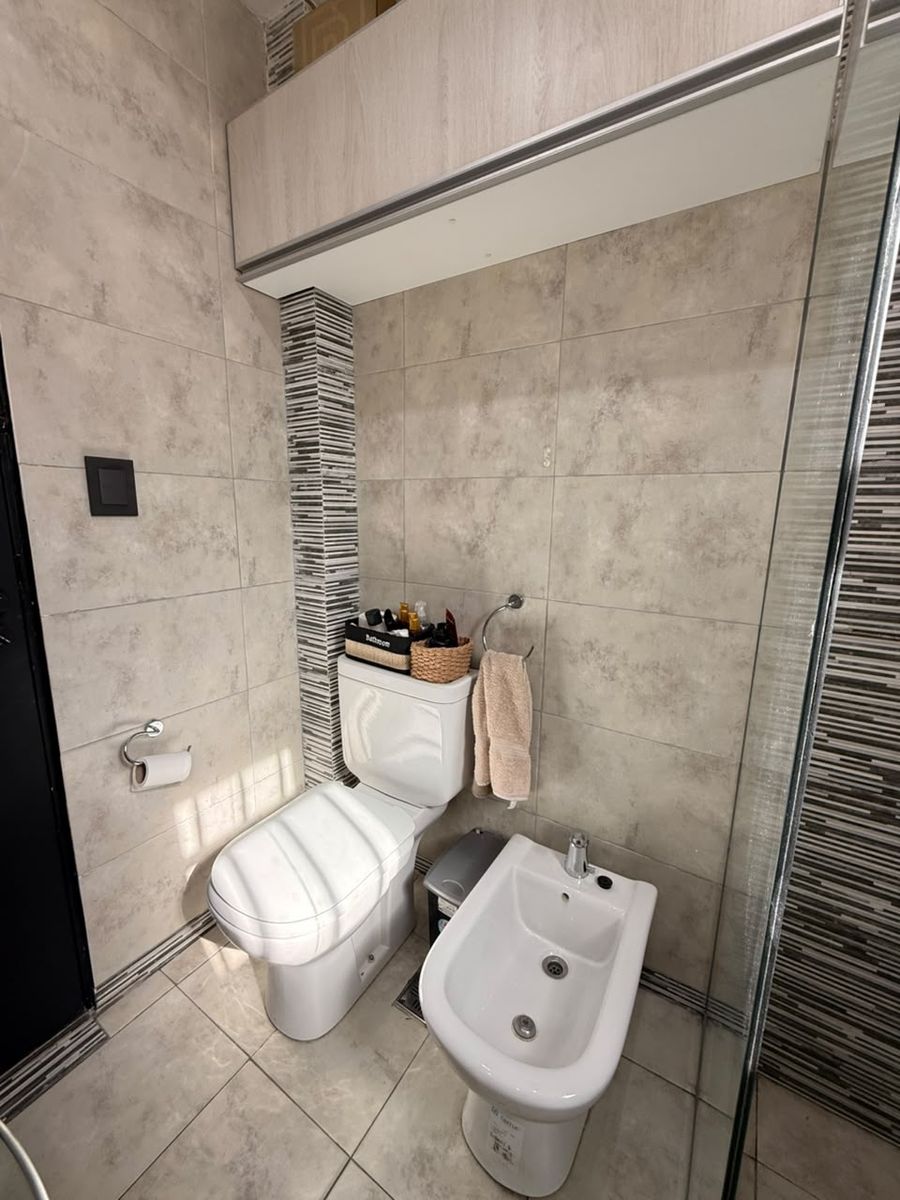 Venta de chalet reciclado a nuevo de 3 ambientes con quincho cerrado, patio y cochera - Boulevard San Martín al 2500 — foto 5