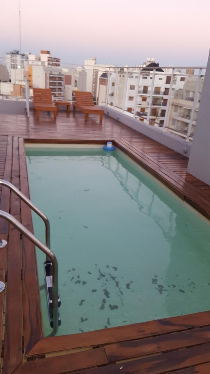 MONOAMBIENTE DIVISIBLE, CON COCHERA Y BAULERA ,BALCÓN CON DECK, SUM, PISCINA, EXCELENTE UBICACIÓN — foto 2