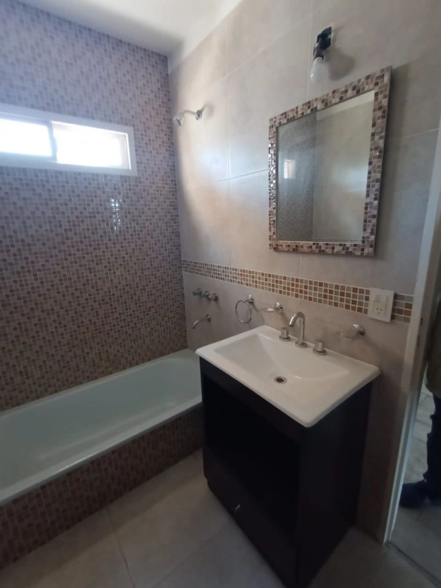 VENTA - EXCELENTE DEPARTAMENTO 2 AMBIENTES A ESTRENAR - CON COCHERA - 12