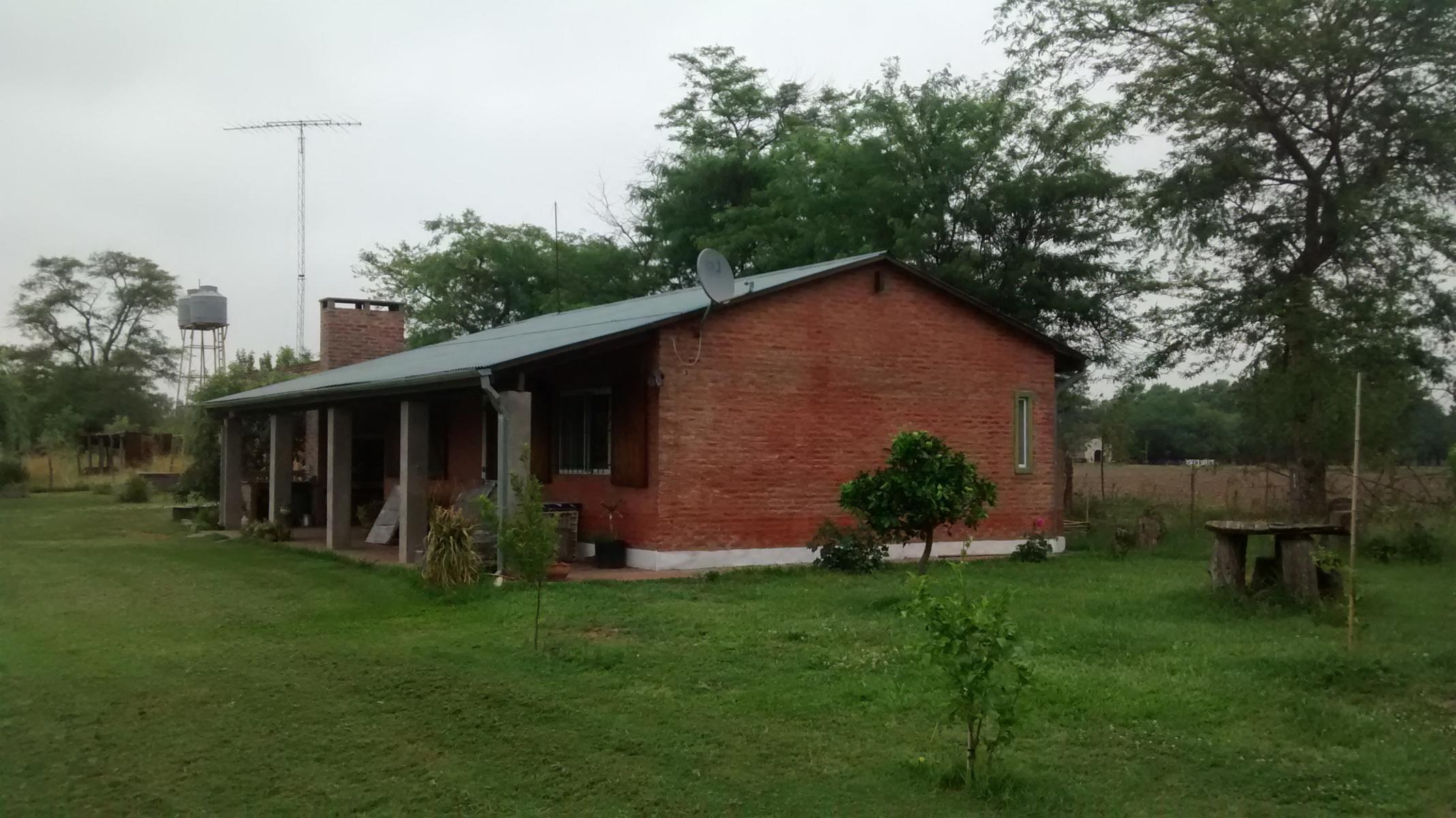 Complejo turístico de 3 cabañas, casa de caseros, 2 galpones, pileta de natación. Terreno de 1 ha. - 4