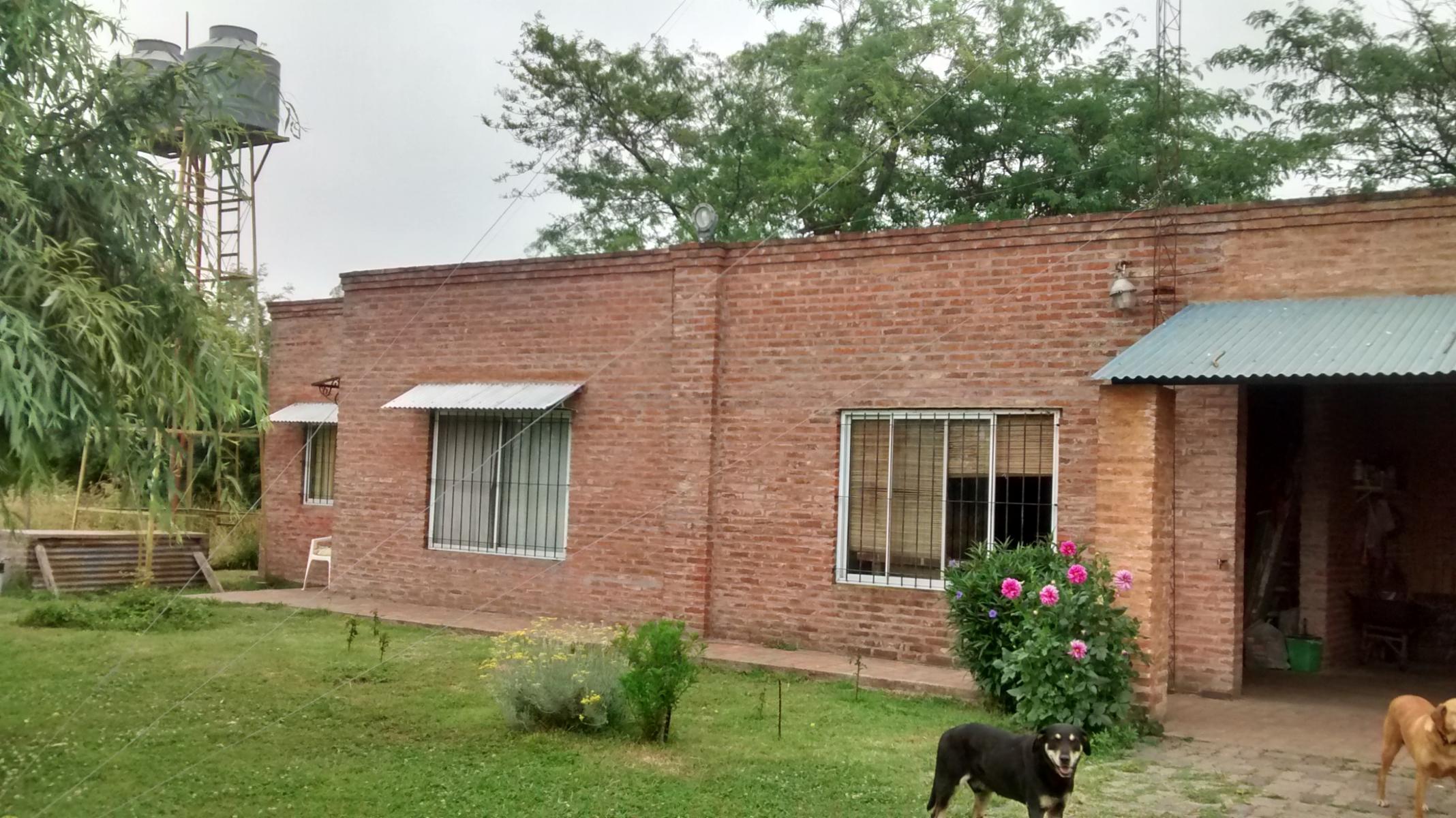 Complejo turístico de 3 cabañas, casa de caseros, 2 galpones, pileta de natación. Terreno de 1 ha. - 5