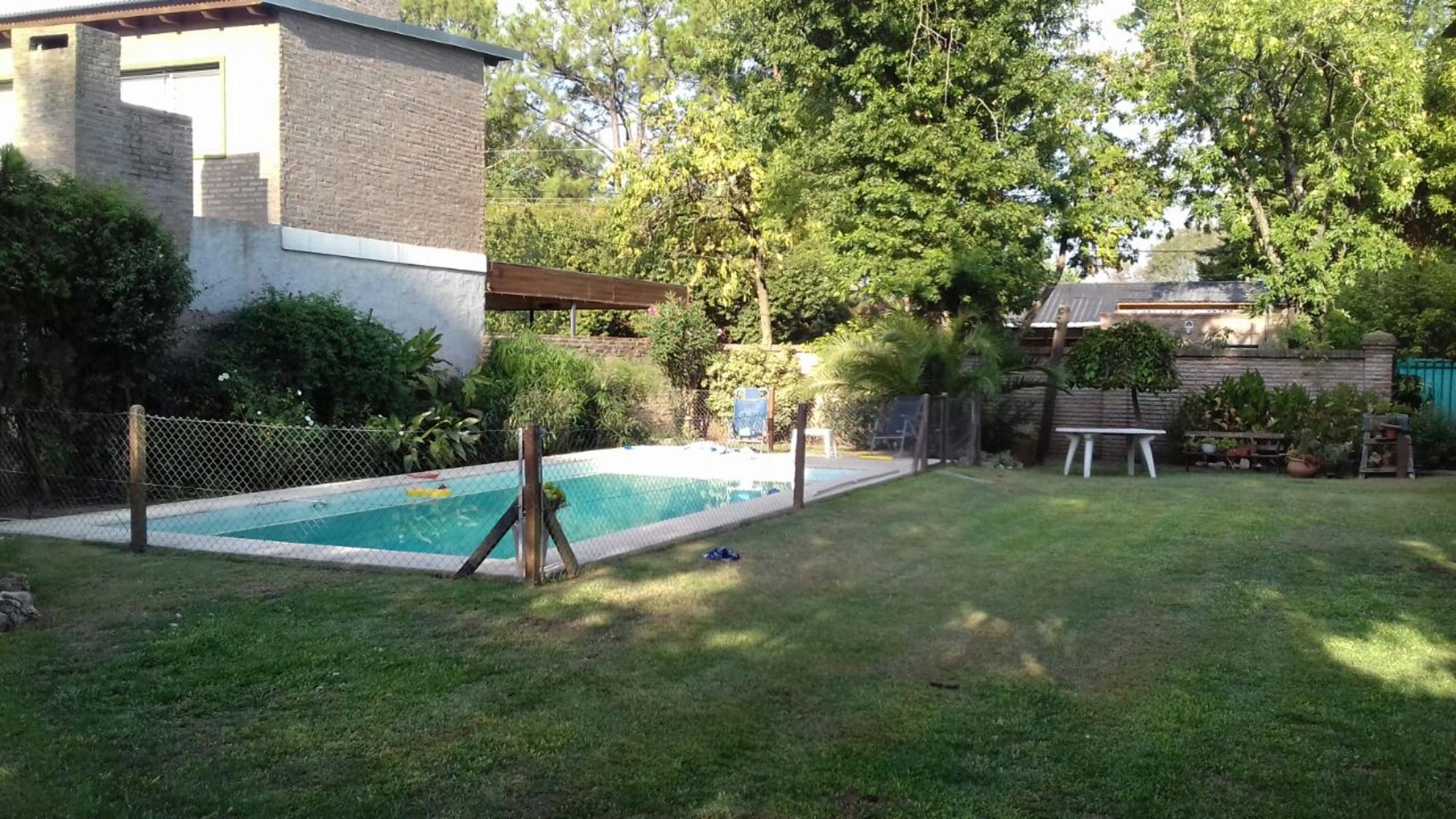 AMPLIA CASA 4 DORMITORIOS. PISCINA. JARDÍN. FUNES — foto 4