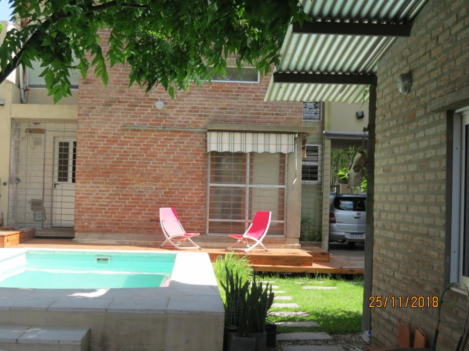 EXCELENTE CASA EN FUNES. 2 DORMITORIOS. PISCINA. QUINCHO. COCHERA. — foto 8