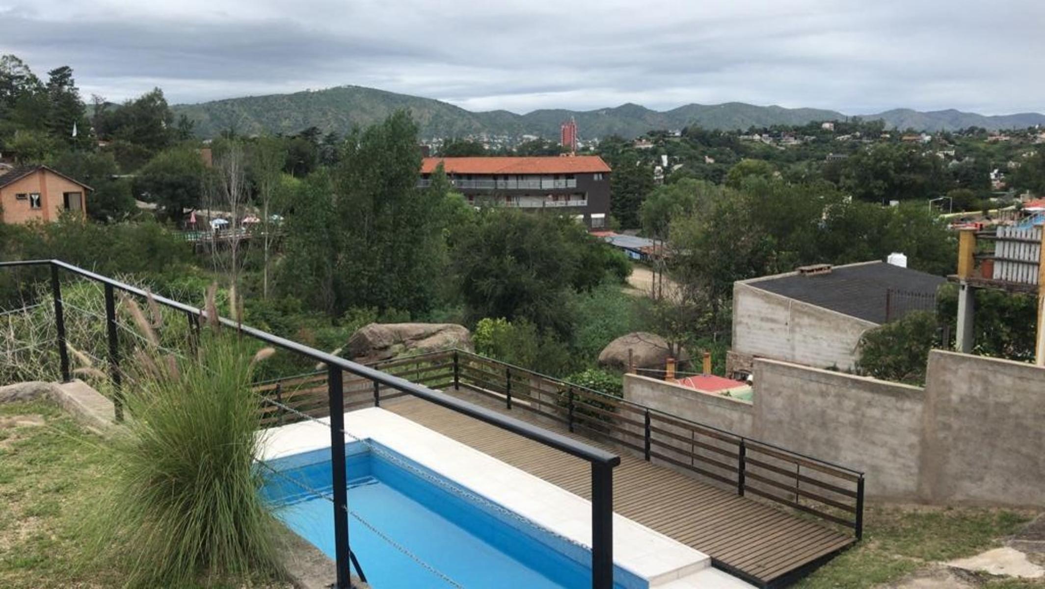 PROPIEDAD EN VENTA EN VILLA DEL LAGO A METROS DE BV. SARMIENTO — foto 2