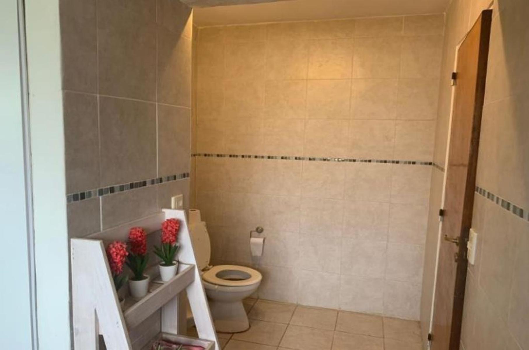 2 CASA EN 2 LOTES CON PILETA — foto 2
