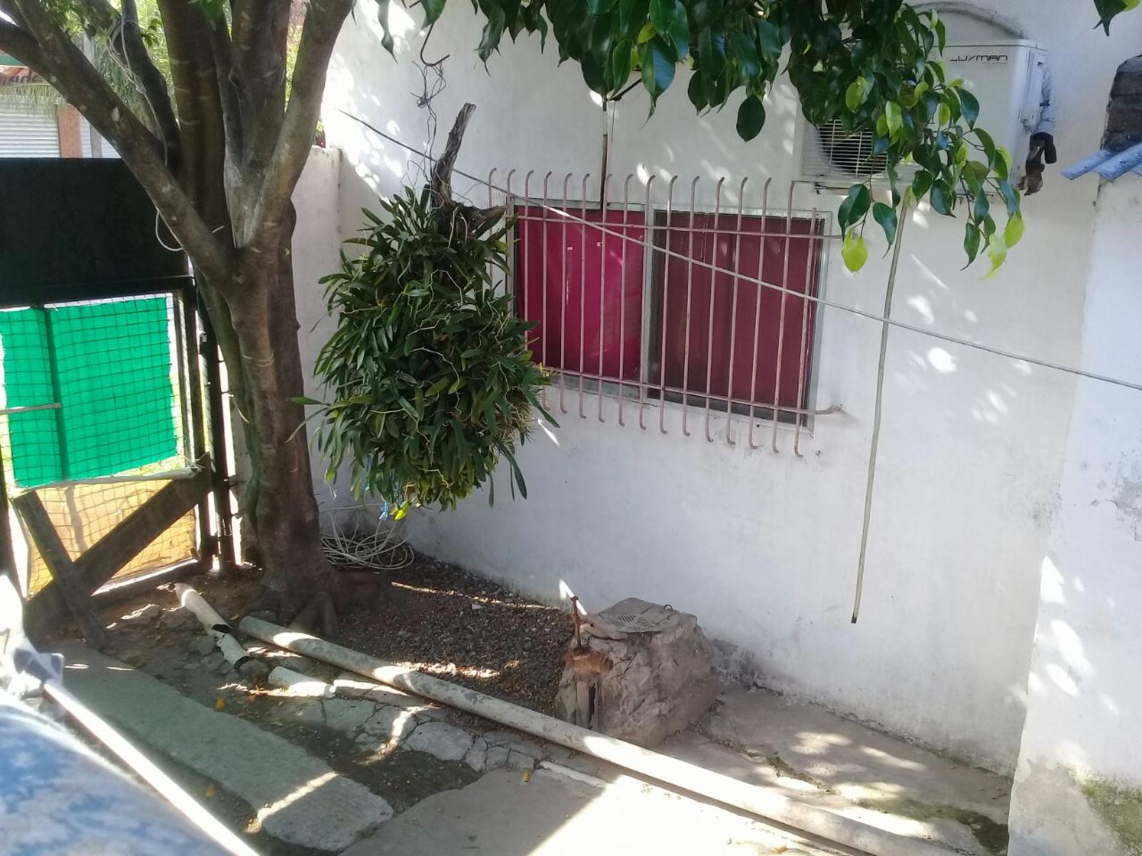 Propiedad multifamiliar 2 casas con patio