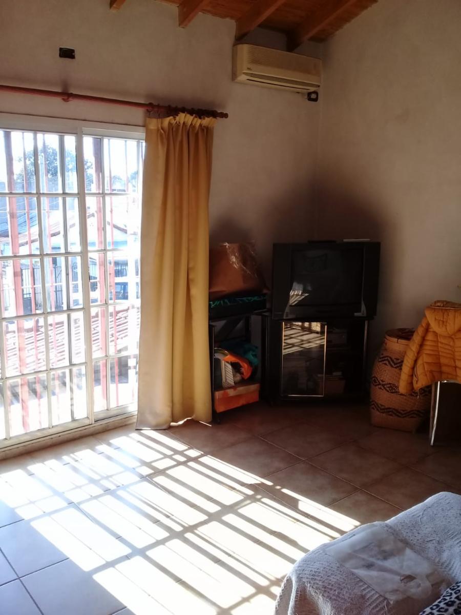 EXCELENTE CASA EN 2 PLANTAS DE 4 AMBIENTES,COCHERA Y FONDO LIBRE. — foto 12