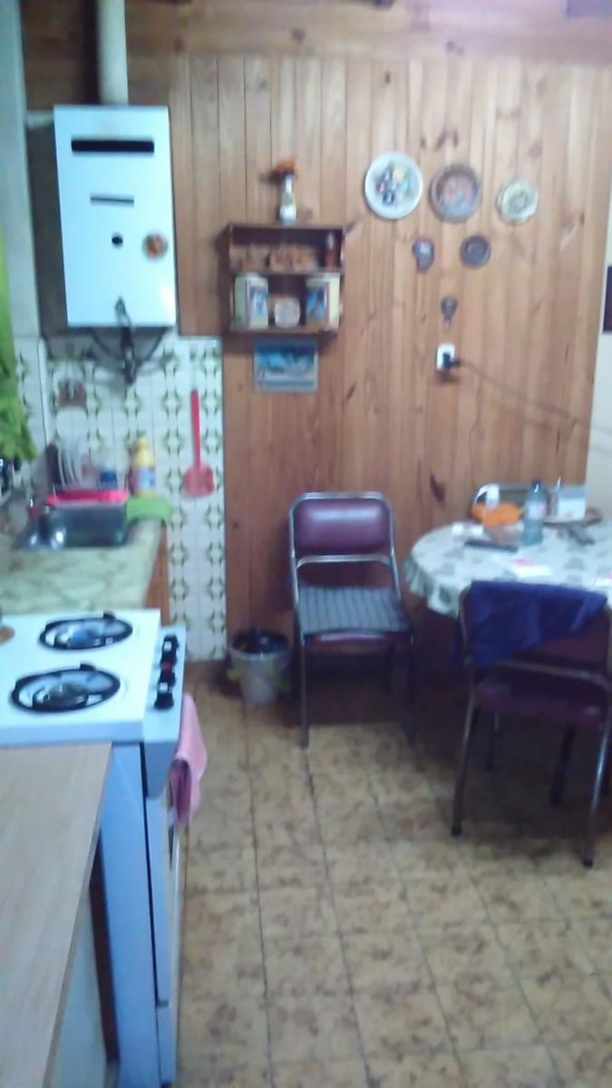 CASA MULTIFAMILIAR APTO 2 FAMILIAS EN LOTE DE 400 M2, E/AUTO, QUINCHO Y FONDO LIBRE