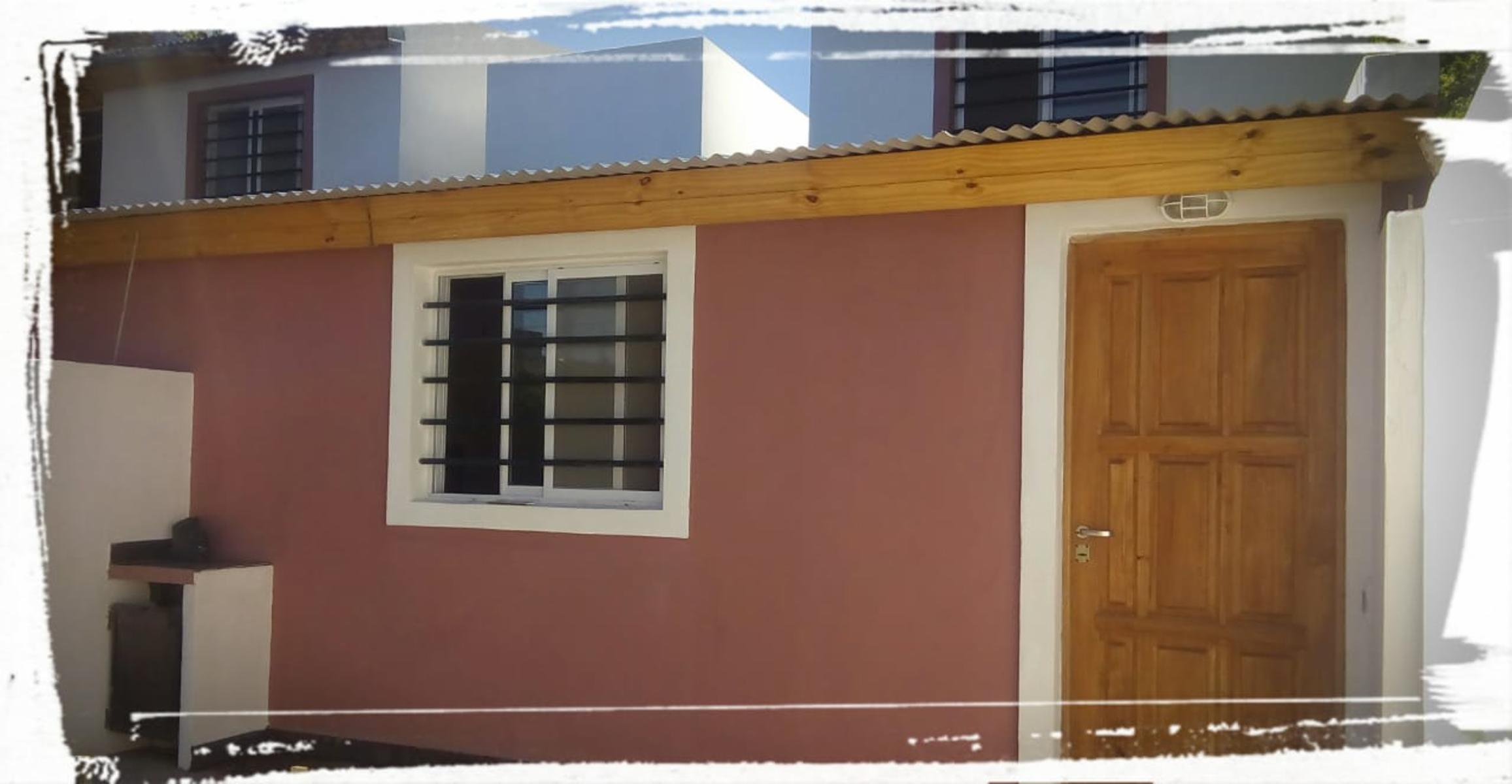 EXCELENTE DUPLEX EN PLANTA BAJA CON COCINA COMEDOR INCLUYENDO ARTEFACTO COCINA, TERMOTANQUE, BAÑO, HABITACIÓN, PATIO TRASERO PRIVADO, PATIO DE FRENTE COMPARTIDO Y HABITACIÓN MATRIMONIAL EN PLANTA ALTA — foto 8
