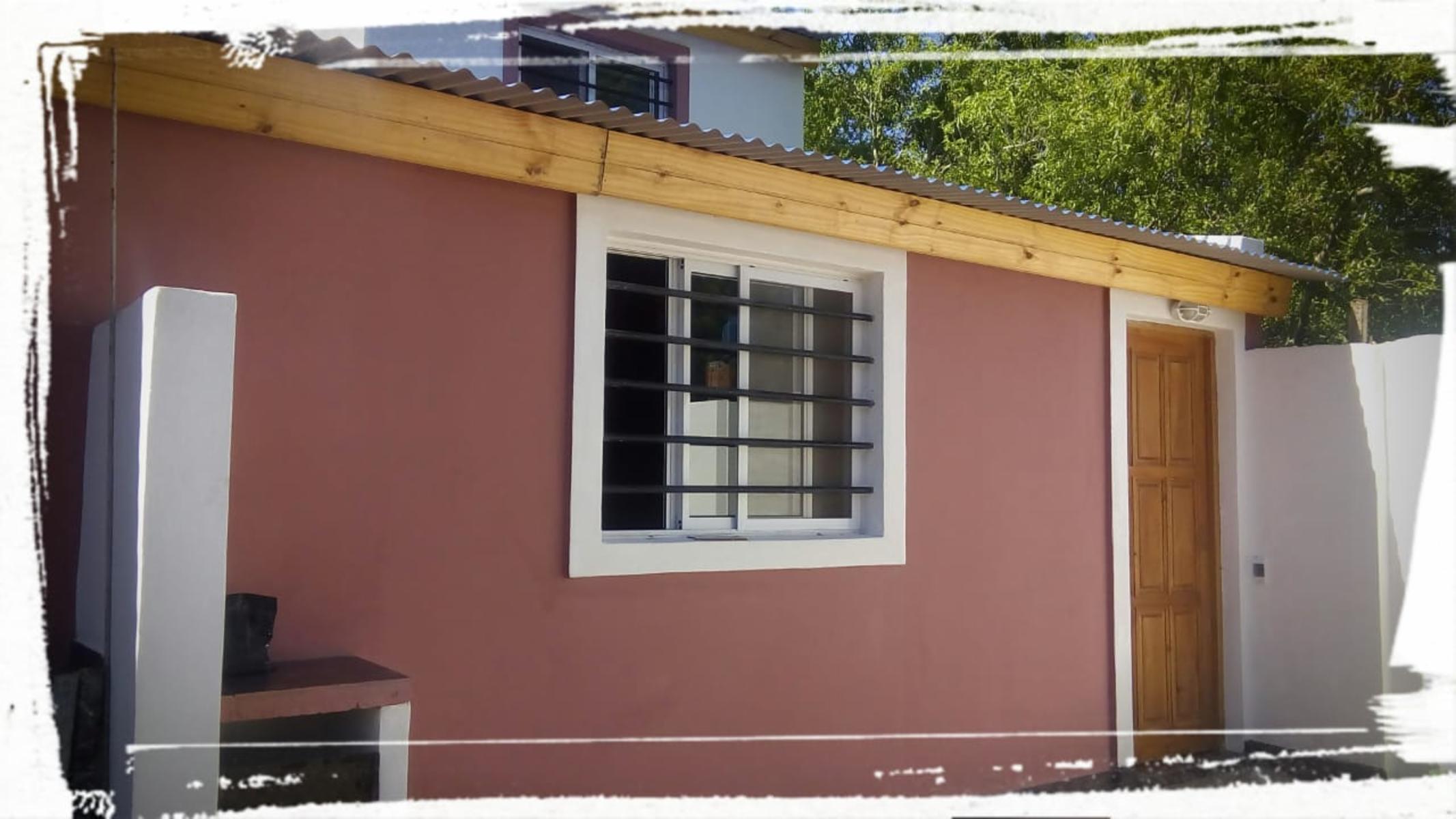 EXCELENTE DUPLEX EN PLANTA BAJA CON COCINA COMEDOR INCLUYENDO ARTEFACTO COCINA, TERMOTANQUE, BAÑO, HABITACIÓN, PATIO TRASERO PRIVADO, PATIO DE FRENTE COMPARTIDO Y HABITACIÓN MATRIMONIAL EN PLANTA ALTA — foto 10