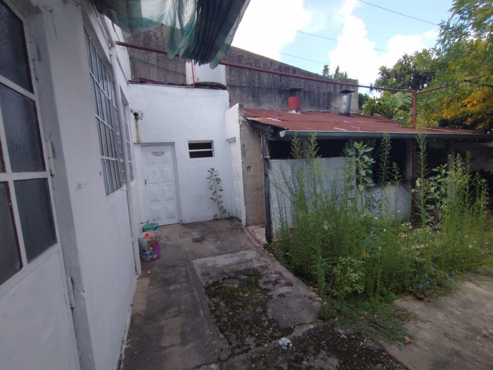 GALPÓN AL FONDO POR PASILLO CON ENTRADA INDEPENDIENTE, AMPLIO ESPACIO MULTIUSO, QUINCHO CON PARRILLA, 2 BAÑOS Y COCINA. - 6