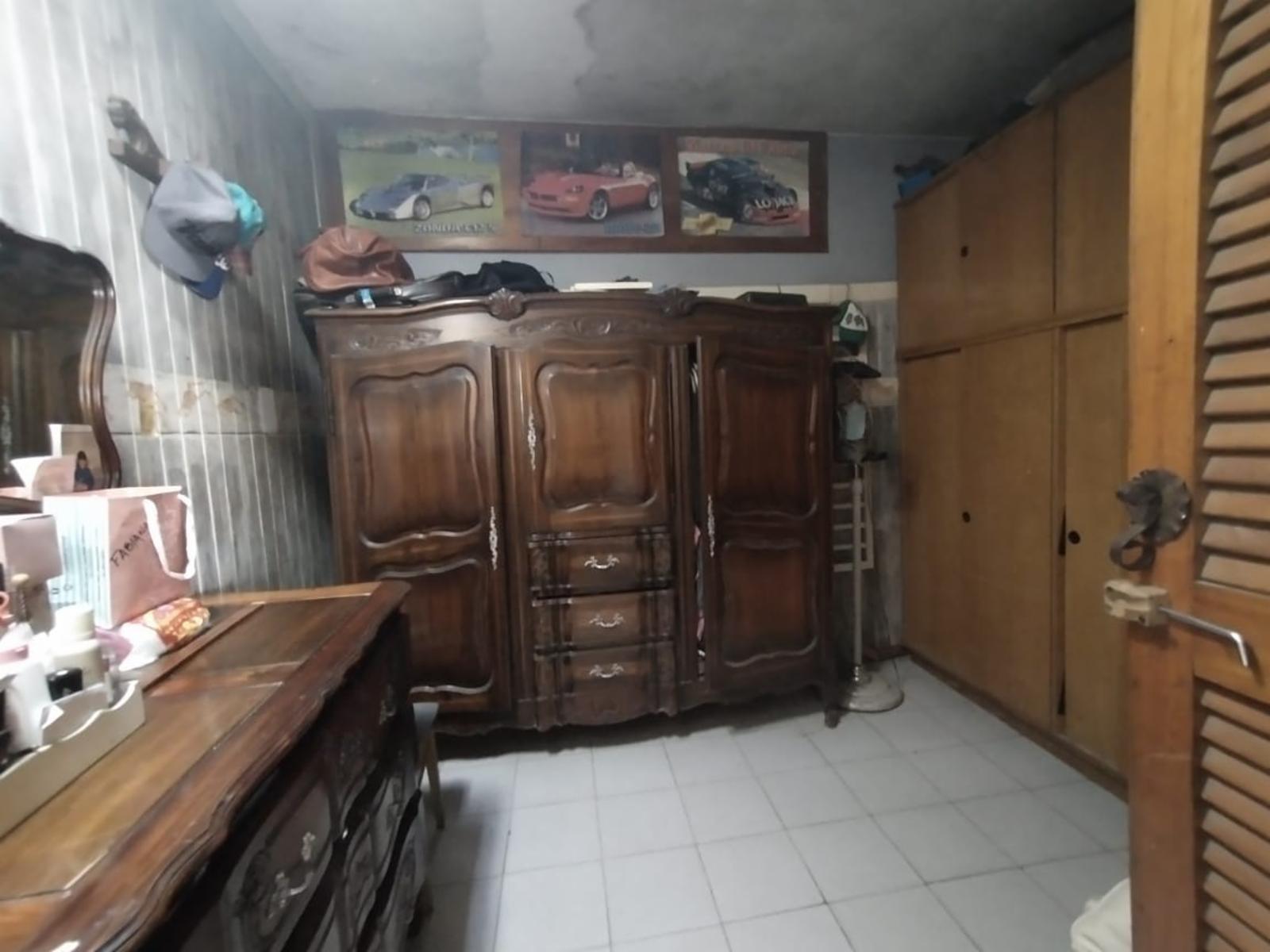 PH FONDO EN BUEN ESTADO CON 2 DORMITORIOS, ESCRITORIO, COCINA-COMEDOR INTEGRADA, AMPLIO BAÑO CON DUCHA, PATIO Y GALPÓN DE HERRAMIENTAS. — foto 14