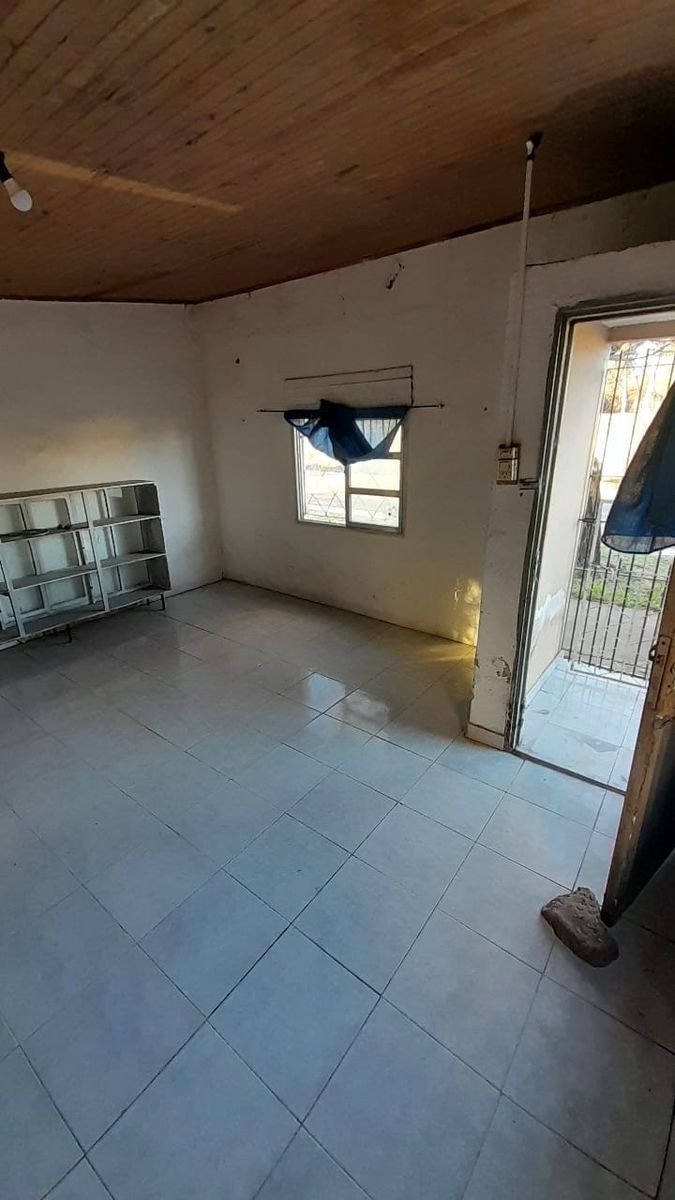 Casa a restaurar con salón en excelente ubicación y amplio lote — foto 10