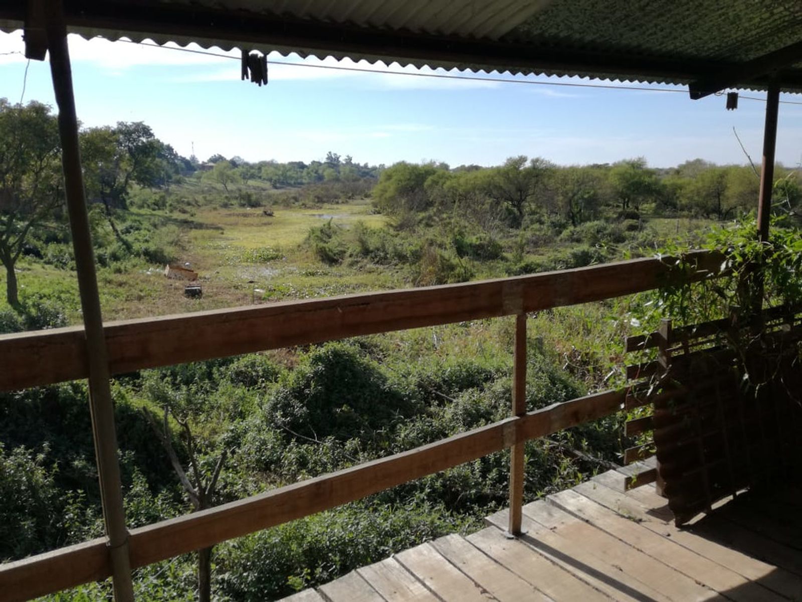 GRAN TERRENO Y CASA FRENTE AL RÍO - PARAJE LOS 2 OMBUES - 1