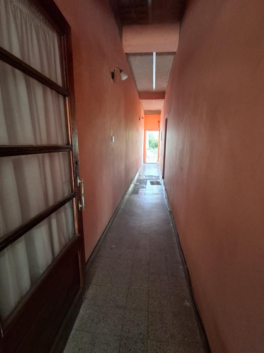 CASA CON DOS LOCALES SOBRE AVENIDA — foto 7