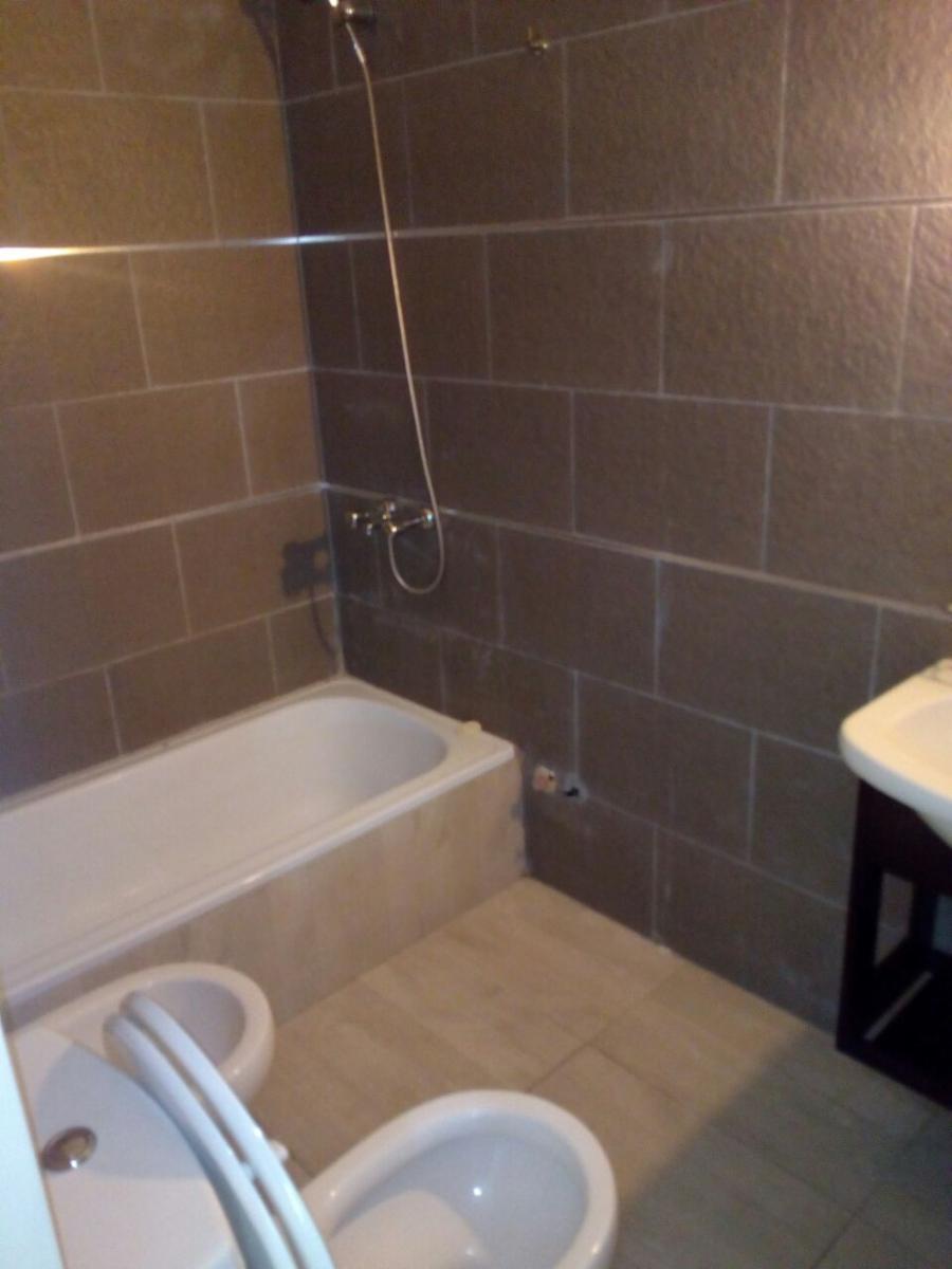 DPTO EN VENTA 2 AMBIENTES CON COCHERA, J. L. SUAREZ