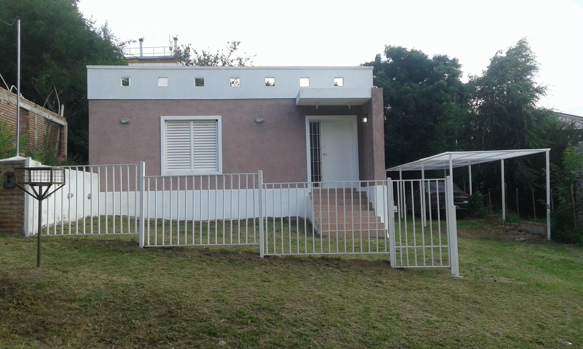 VENTA LOTE CON 2 CASAS DE DOS AMBIENTES, BIALET MASSE, CORDOBA — foto 2