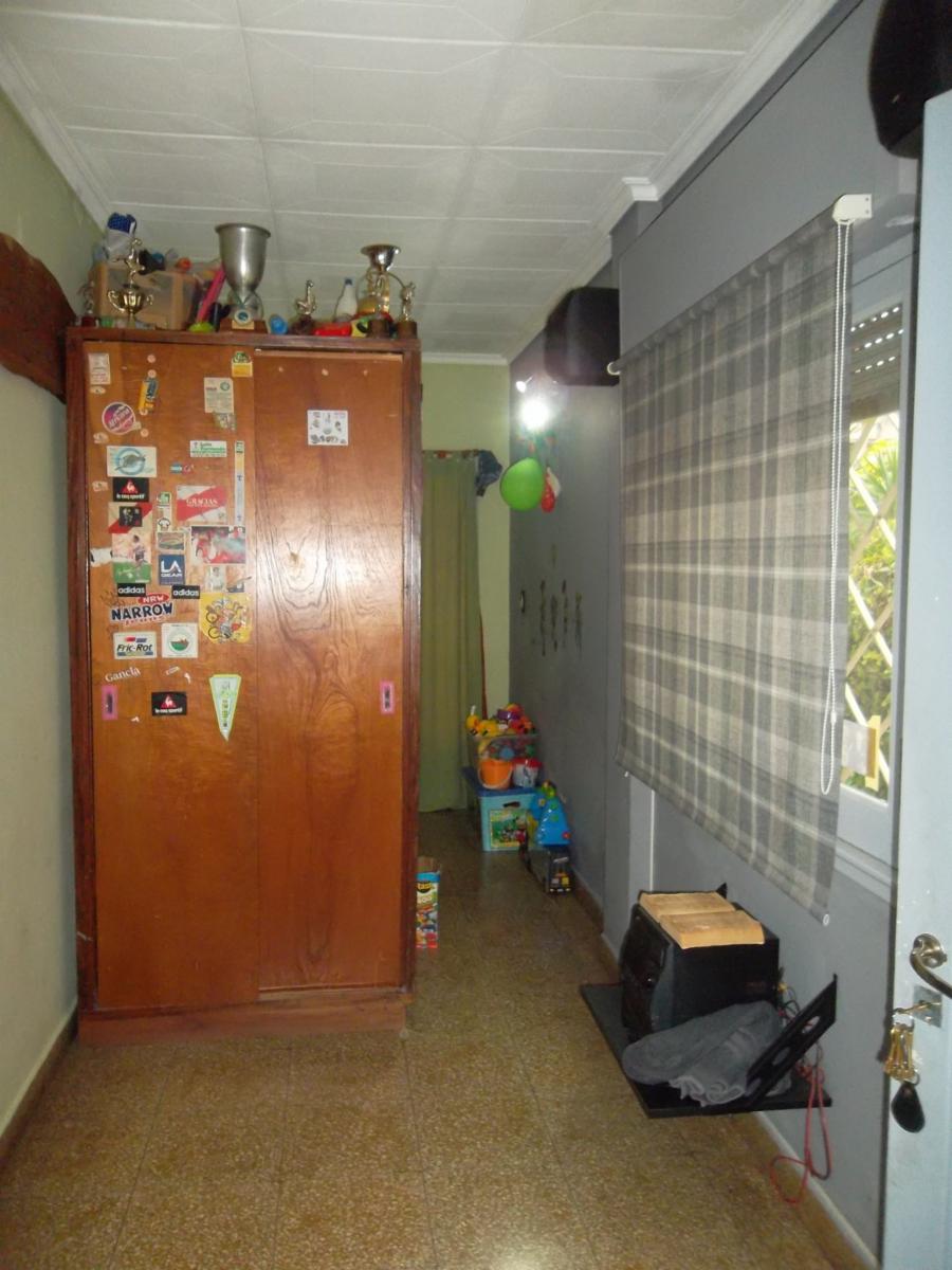 VENTA CASA MULTIFAMILIAR CON JARDIN Y COCHERA, V. BALLESTER — foto 4