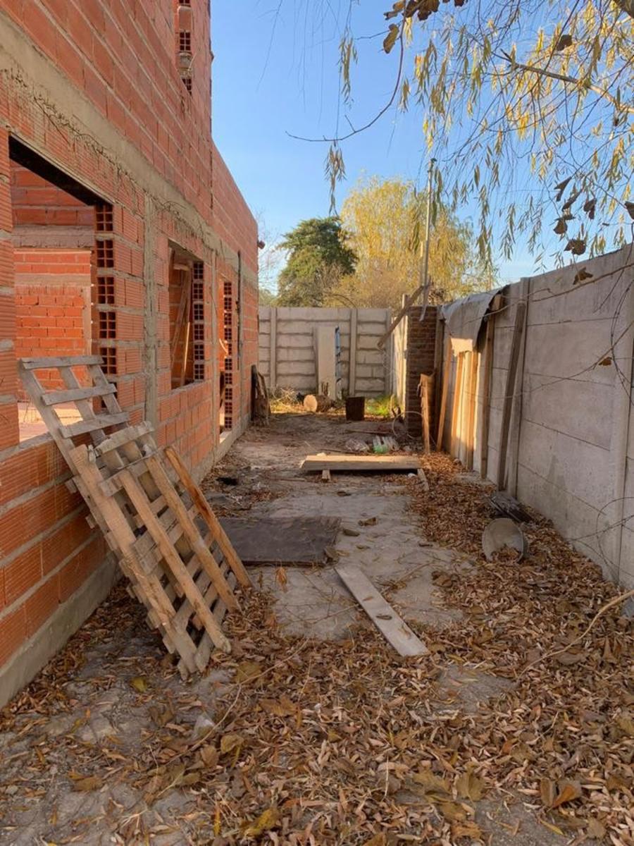 Lote en esquina con entrada por ambos lados . Casa a terminar en Benavidez Barrio ElCano — foto 7