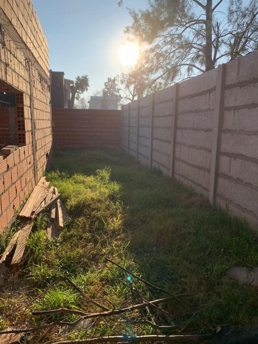 Lote en esquina con entrada por ambos lados . Casa a terminar en Benavidez Barrio ElCano — foto 8