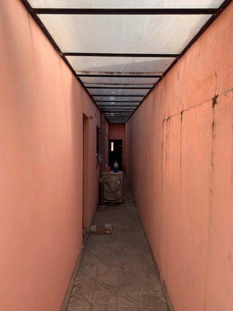 Casa 4 ambientes con cochera y fondo oportunidad — foto 12