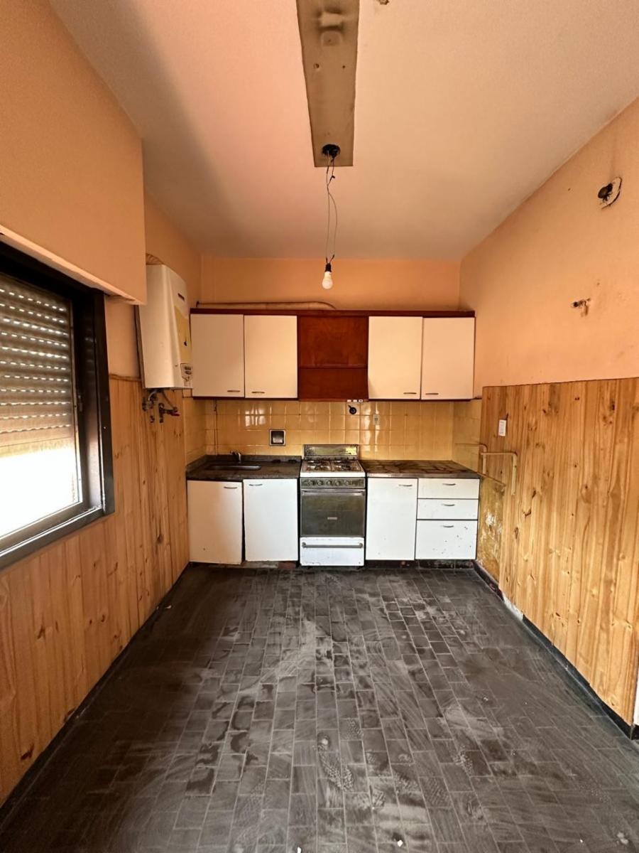 VENTA - CASA MULTIFAMILIAR - CON REGLAMENTO DE COPROPIEDAD - 14