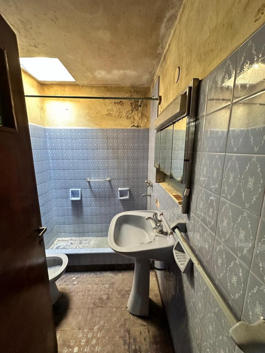 VENTA - CASA MULTIFAMILIAR - CON REGLAMENTO DE COPROPIEDAD - 21