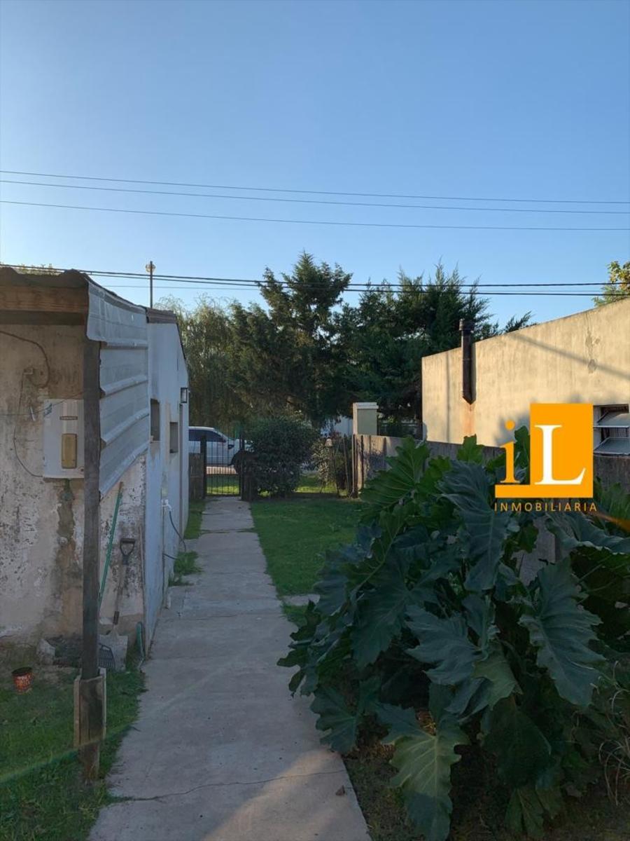 CASA EN VENTA EN Bº LOS PINOS - CNEL. BRANDSEN - 11
