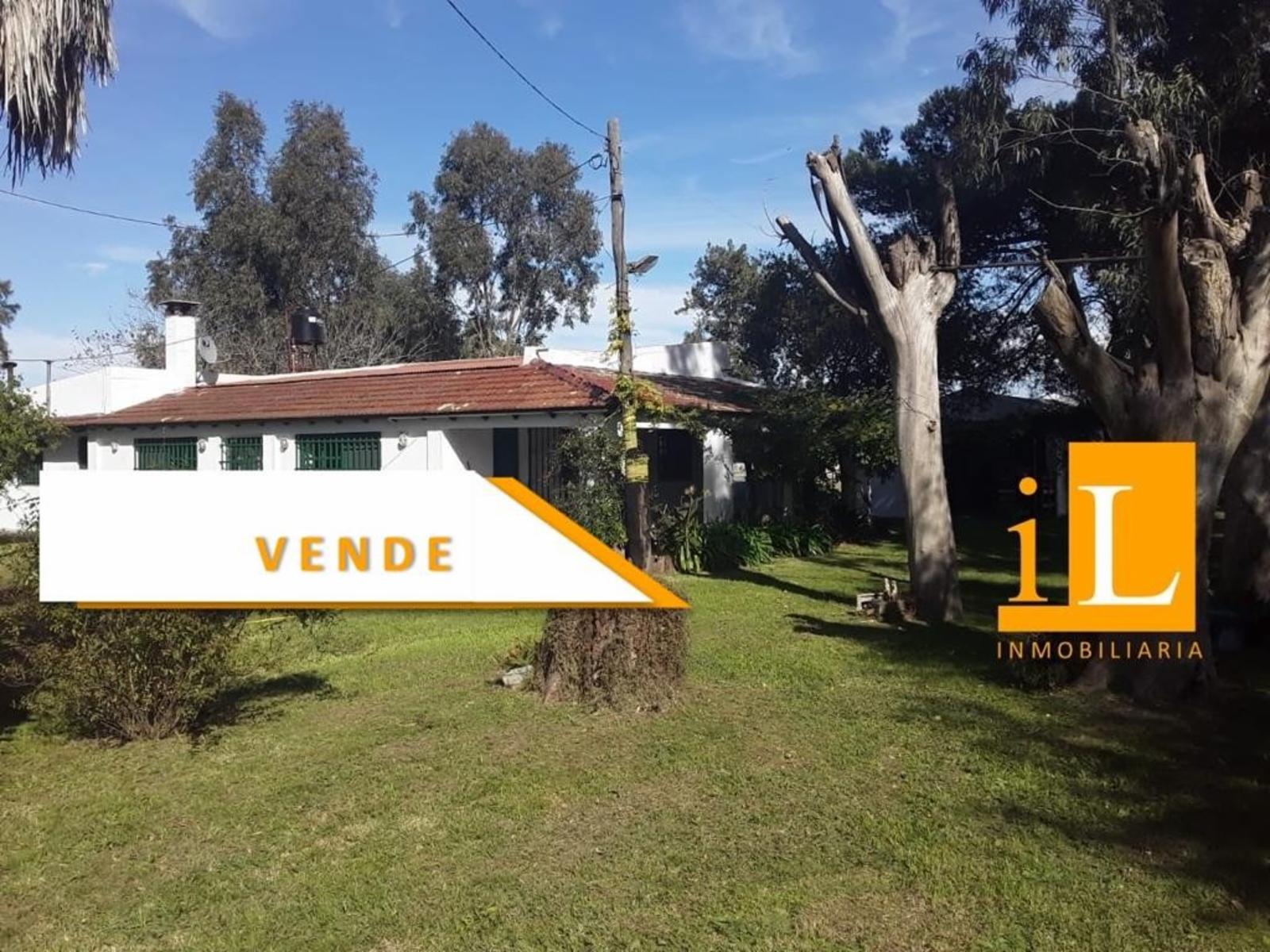 13 hectareas con mejoras en Loma Verde, sobre Ruta 215. - 1