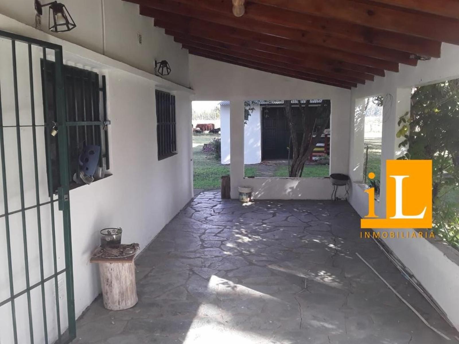 13 hectareas con mejoras en Loma Verde, sobre Ruta 215. - 10