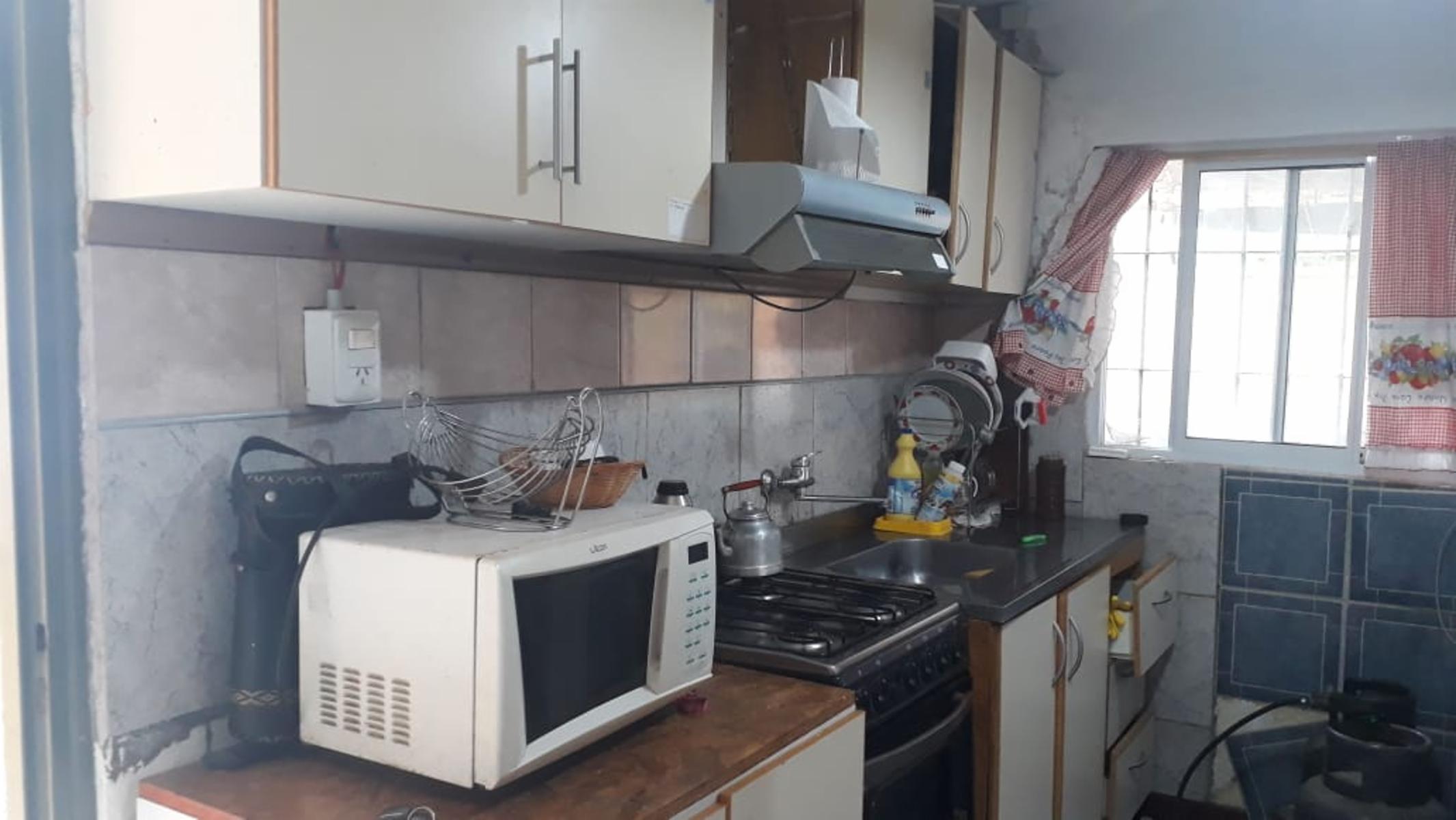 N°REF 1248- DOS PROPIEDADES SOBRE INCREÍBLE TERRENO DE 3300M2 UBICADO EN COSQUÍN A 150 M DE LA RUTA 38 Y A 8 CUADRAS DEL RIO COSQUIN. — foto 2