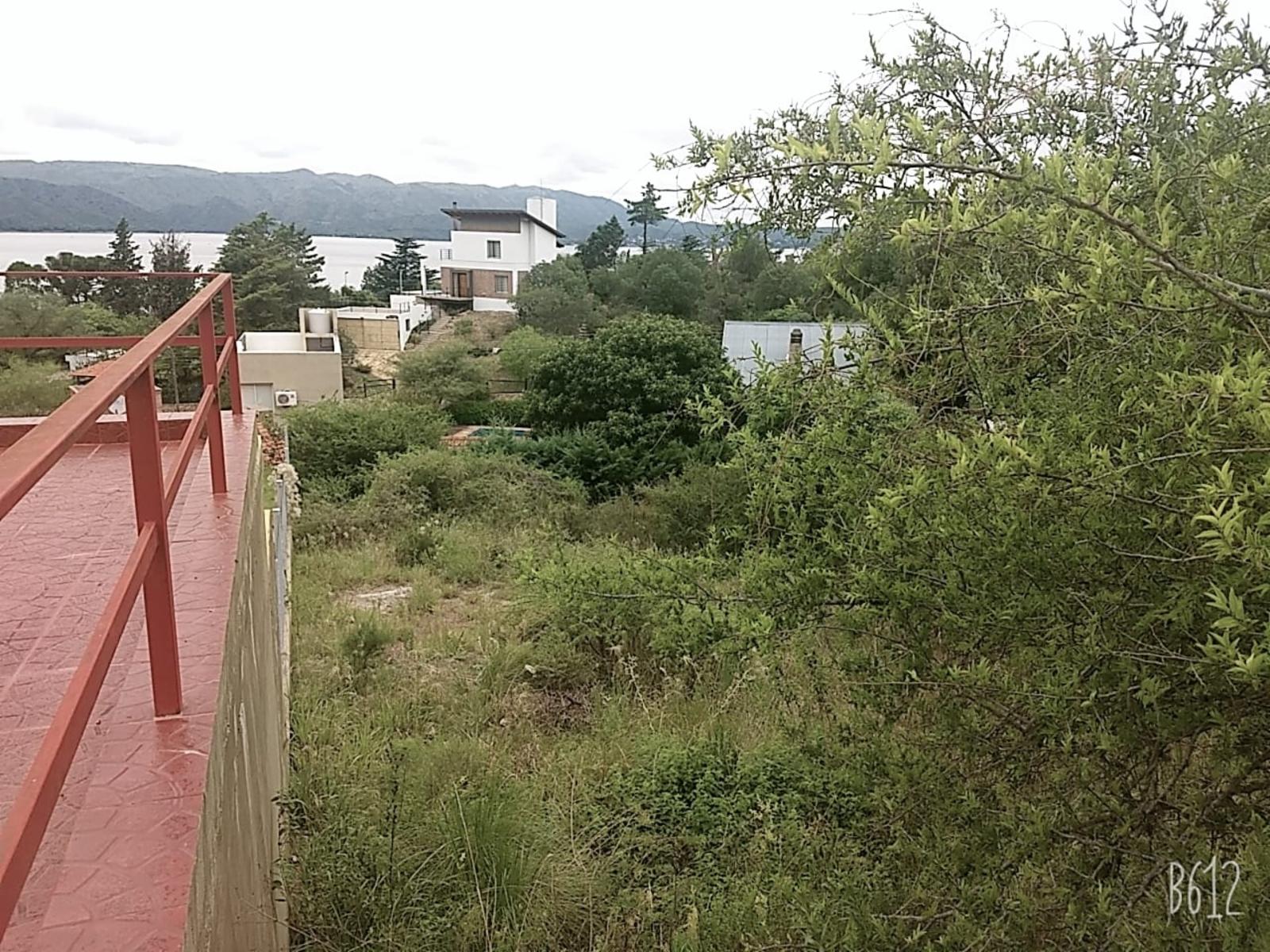 N°Ref 1269-Terreno en Parque Siquiman, con increíble vista al lago San Roque y a 100m de la bajada al lago. — foto 4