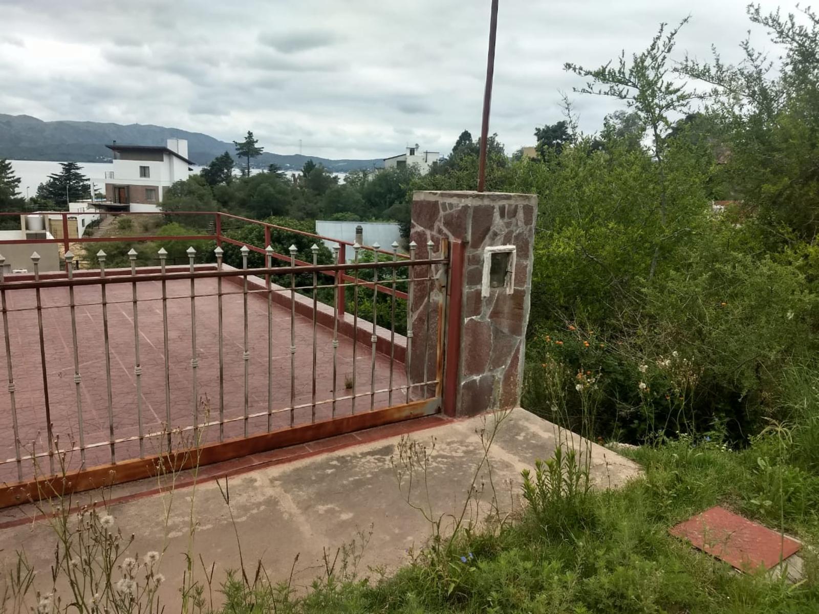 N°Ref 1269-Terreno en Parque Siquiman, con increíble vista al lago San Roque y a 100m de la bajada al lago. — foto 7