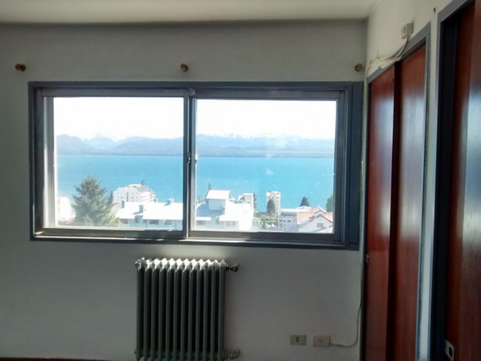 Amplio Departamento céntrico de 2 dormitorios con excelente vista al Lago — foto 6