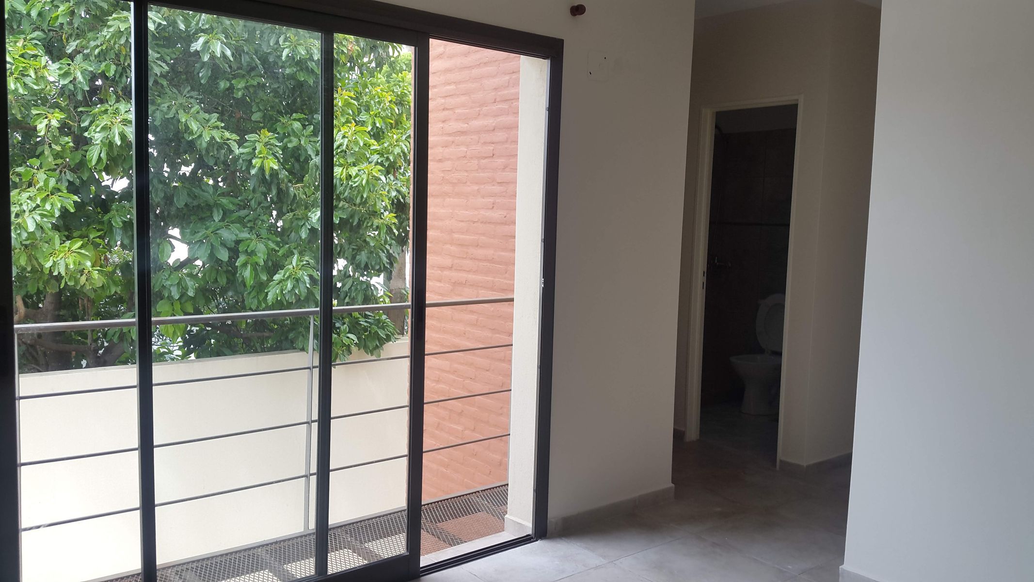 EXCELENTE DEPTO 1 DORM CON BALCON - A MIN DE NUEVOCENTRO SHOPPING - 2
