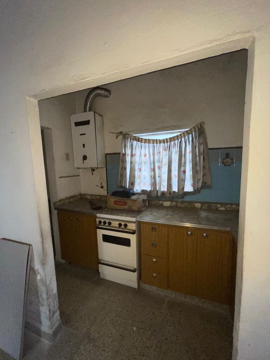 VENTA CASA AL FRENTE DOS AMBIENTES CON GARAJE Y PH AL FONDO DOS AMBIENTES CON PATIO Y ENTRADA INDEPENDIENTE. LA TABLADA - 6