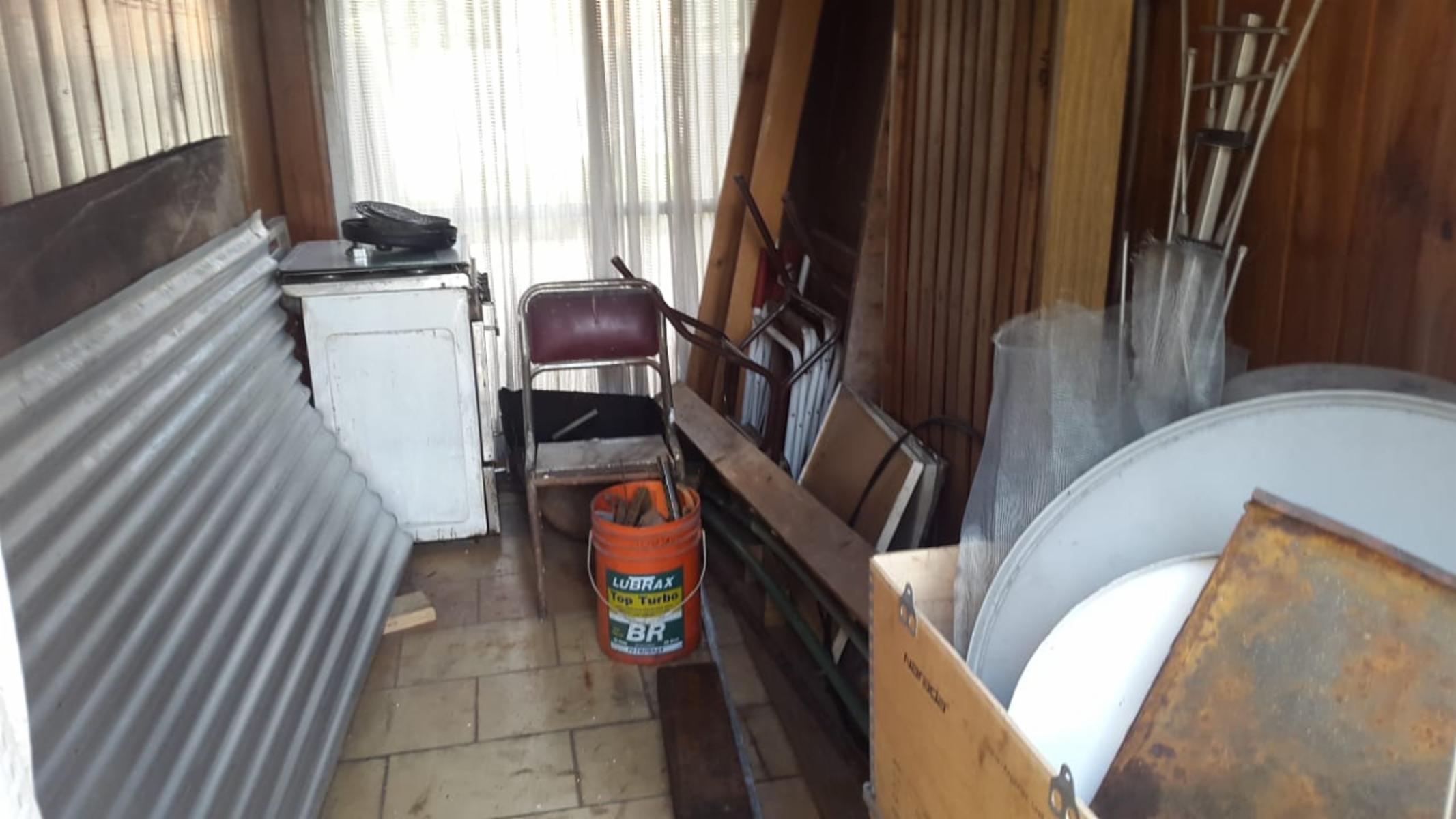CASA DE 5 AMBIENTES CON TALLER AL FRENTE SOBRE TERRENO DE 400m² — foto 12