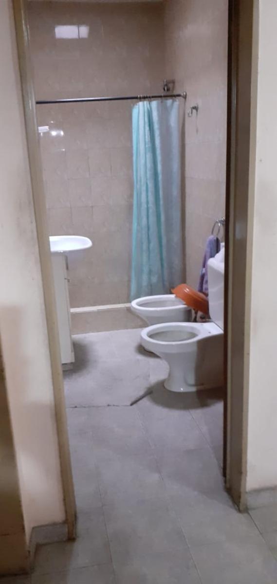 EXCELENTE PROPIEDAD CON UNA CASA EN ESQUINA, DEPARTAMENTO A TERMINAR Y DOS LOCALES EN BLOQUE — foto 6