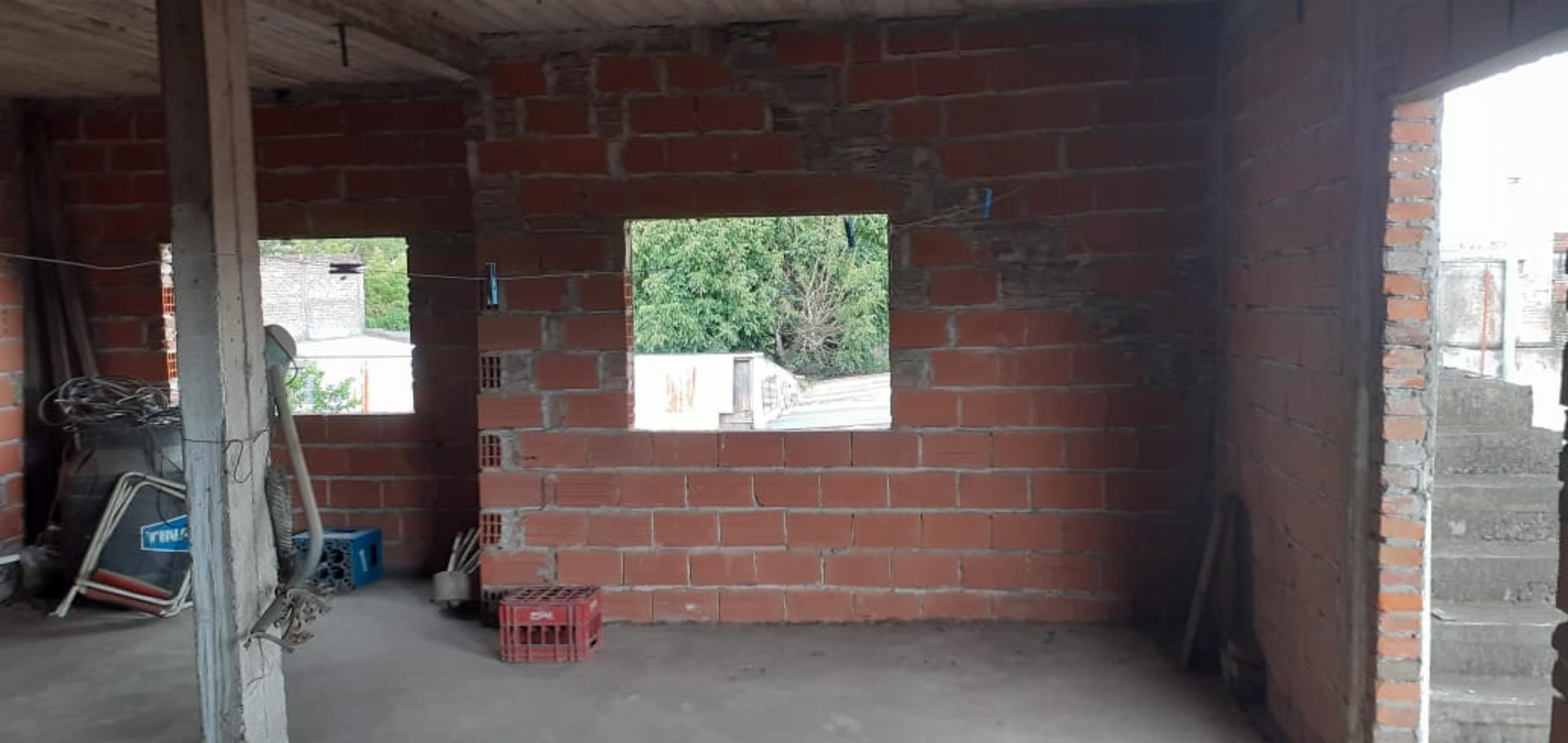 EXCELENTE PROPIEDAD CON UNA CASA EN ESQUINA, DEPARTAMENTO A TERMINAR Y DOS LOCALES EN BLOQUE — foto 14