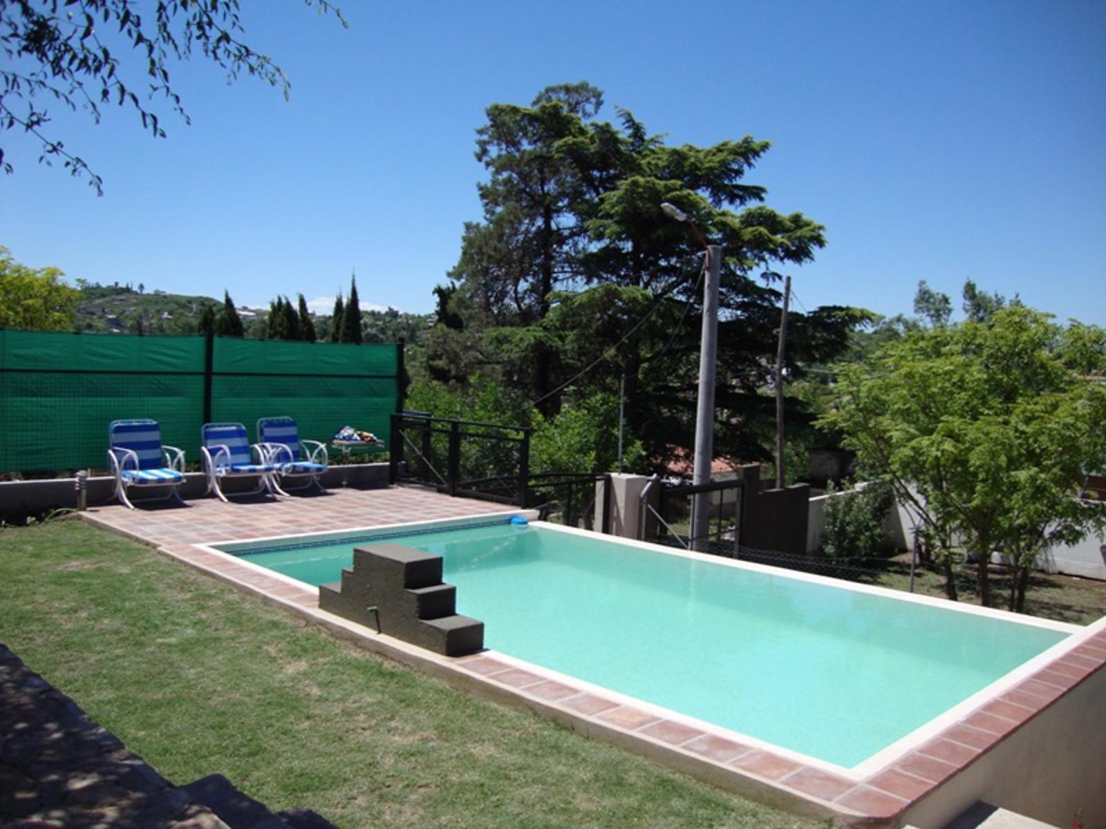 EXCELENTE CASA EN VENTA EN VILLA CARLOS PAZ, 3 DORMITORIOS, PILETA,VISTA PANORÁMICA, HERMOSA. — foto 11