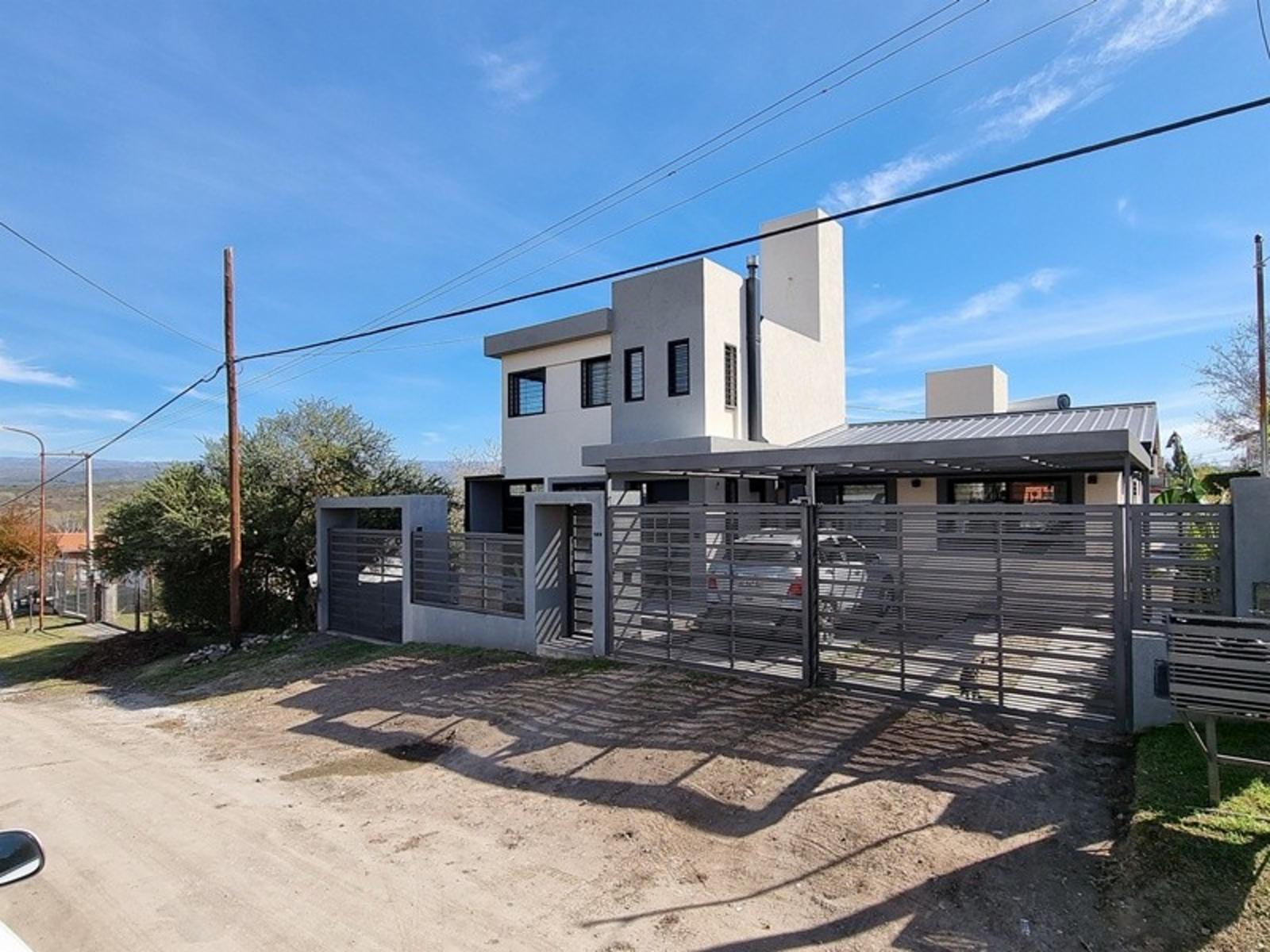 HERMOSA CASA EN VENTA EN SAN ANTONIO DE ARREDONDO, CON PILETA, QUINCHO,4DORMITORIOS, 3 BAÑOS.