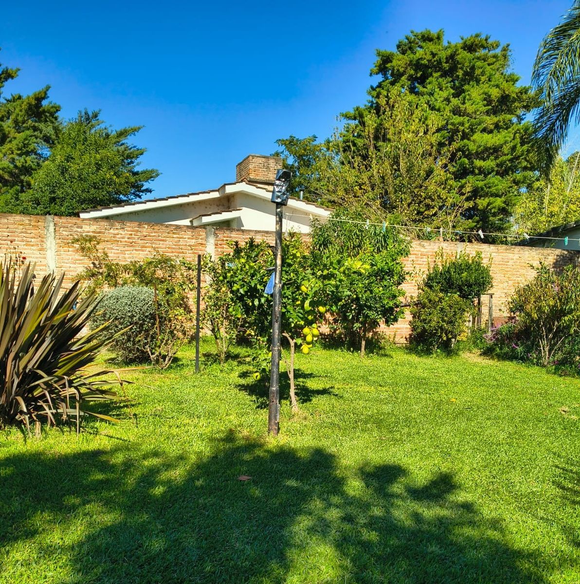 MUY LINDA Y AMPLIA CASA EN VENTA EN CARLOS PAZ, BARRIO SANTA RITA, TODOS LOS SERVICIOS. - 4