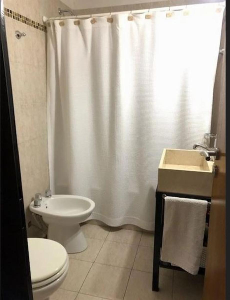 Departamento 3 ambientes planta baja con cochera, patio y lavadero. Excelente estado y ubicación. NUEVO VALOR — foto 5