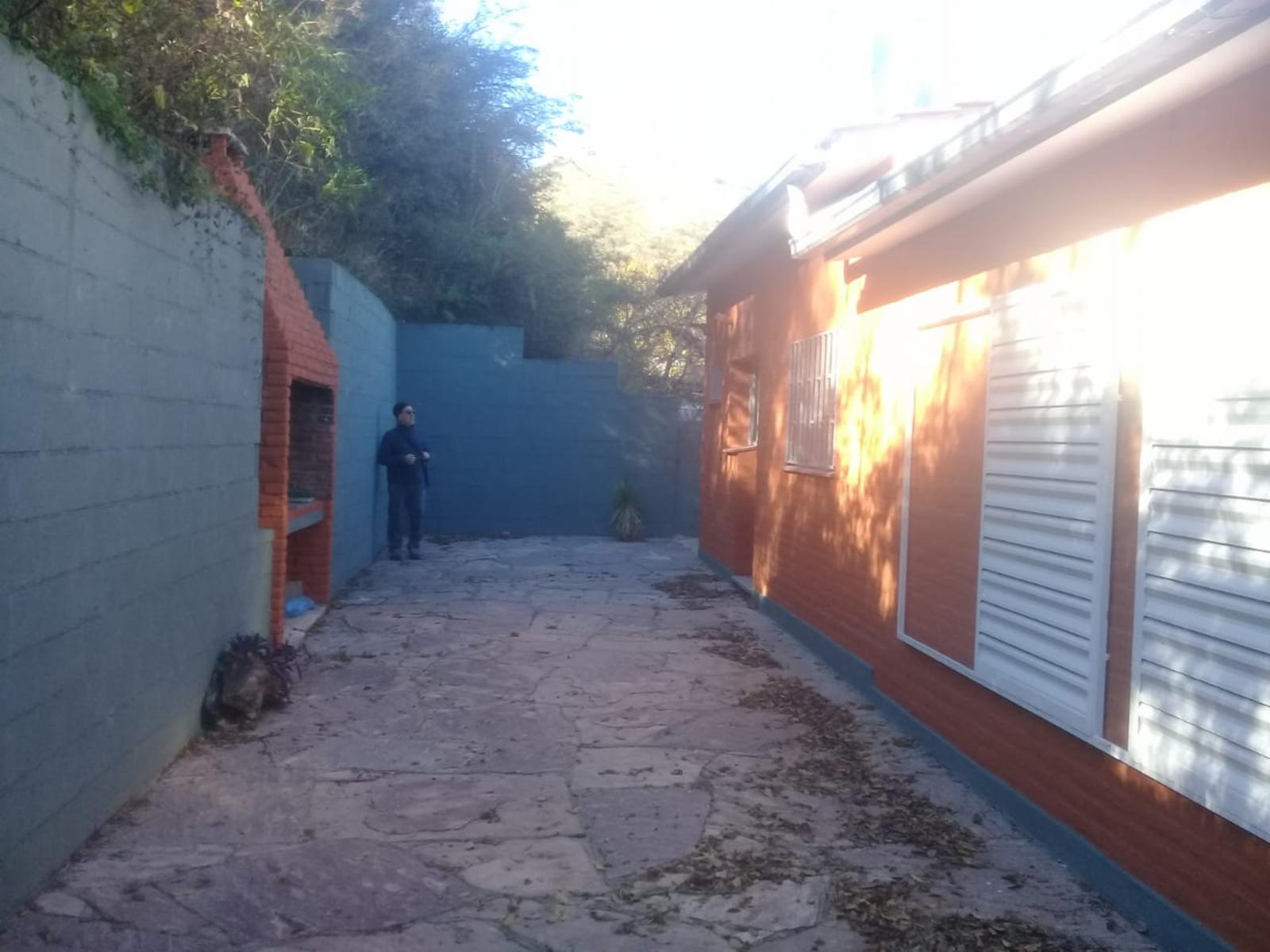 Carlos Paz, a 5 cuadras del centro, Chalet de 3 dormitorios, 2 baños, cocina, lavadero, living_comedor y cochera. 510 m2 de terreno, con 129m2 cubiertos, U$s 180.000, — foto 4