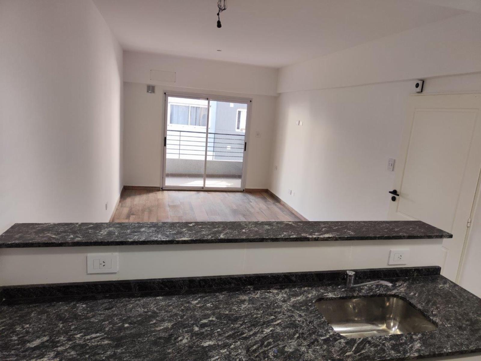 VENTA DE DEPARTAMENTO 2 AMBIENTES EN PLENO CENTRO DE MONTE GRANDE - CON COCHERA — foto 3
