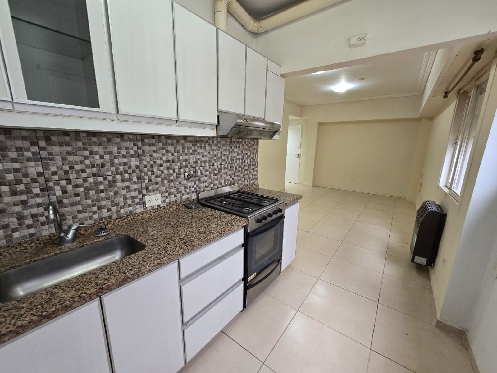 VENTA DE DEPARTAMENTO 2 AMBIENTES CON COCHERA - APTO CRÉDITO HIPOTECARIO - 17