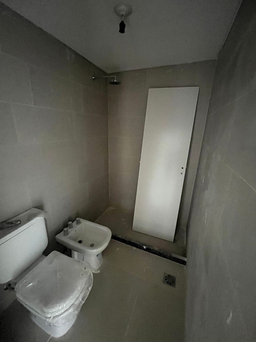 VENTA DEPARTAMENTO DOS DORMITORIOS CON BALCON EN L Y COCHERA - 8